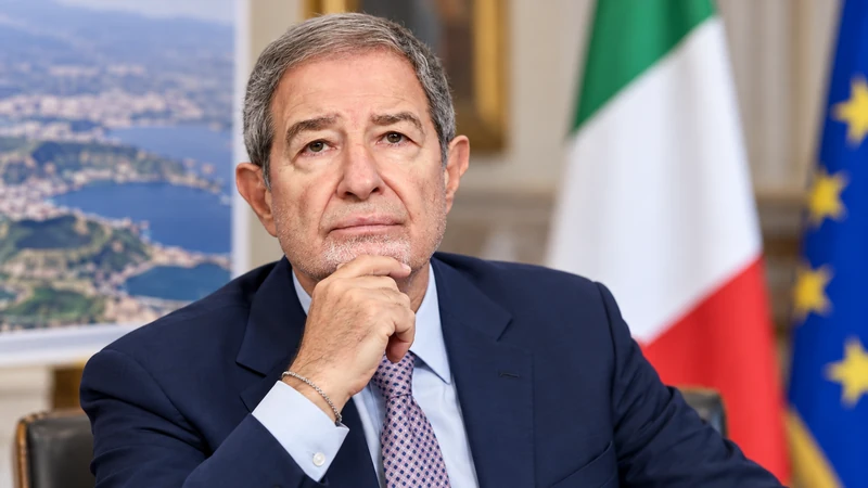 Illustrazione editoriale IA con somiglianza sintetica di Nello Musumeci in contesto istituzionale; non rappresenta una catastrofe o un'evacuazione.