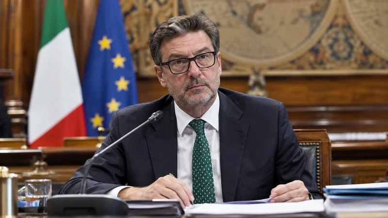 Somiglianza sintetica editoriale IA di Giancarlo Giorgetti in ambiente parlamentare; non documenta l'audizione del 12 ottobre.