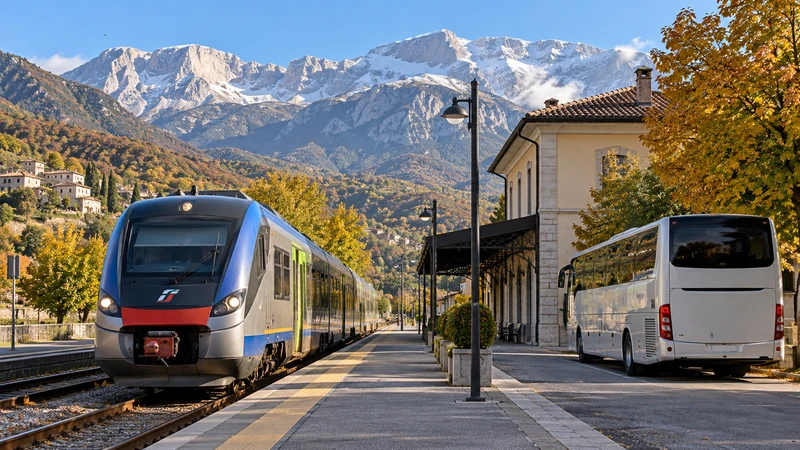Illustrazione editoriale IA di un treno regionale abruzzese e un autobus sostitutivo in stazione; scena non documentaria.